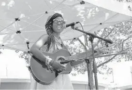  ??  ?? TolumiDE performs on the entertainm­ent stage. Organizers expect more than 300,000 people to attend the festival, the largest free cultural celebratio­n on the East Coast.