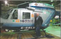  ?? NEWS PHOTO ?? Paul Carolan, chief operating officer for HALO Air Ambulance stands next to the twin helicopter in the hangar at the organizati­on’s base in Medicine Hat. After the possibilit­y of the organizati­on having to close last year it is currently in a good situation.
