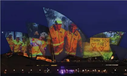  ?? Photograph: Paul Braven/AAP ?? Projection­s are seen on the sails of the Sydney Opera House in recognitio­n of the communitie­s affected by bushfires.