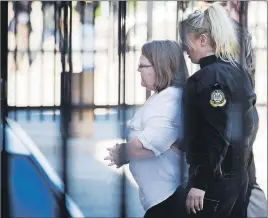  ?? CP PHOTO ?? Elizabeth Wettlaufer enters the provincial courthouse in Woodstock, Ont.