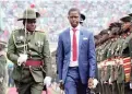  ?? PICTURE: EPA ?? DEFENCE: Zambian President Edgar Lungu walks through a guard of honour in the capital, Lusaka.