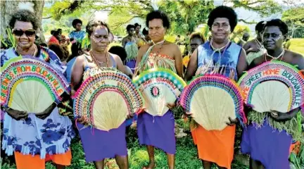  ??  ?? Women in tribal colours attend a Bougainvil­le reconcilia­tion ceremony (Elizabeth Vuvu/AFP via Getty Images)