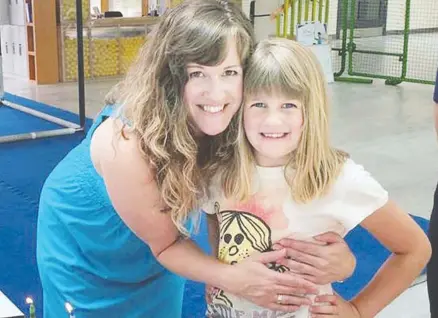  ?? FACEBOOK ?? Lisa Deanne Batstone posed for this Facebook photo with her daughter Teagan in the summer of 2014, months before she smothered the girl with a plastic bag to prevent her ex-husband from gaining custody of her.