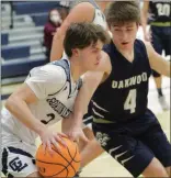  ?? Scott Herpst ?? Gordon Lee’s Evan Parham tries to get past Oakwood Christian’s Jarrett Chambers during last Monday’s crosstown clash in Chickamaug­a.