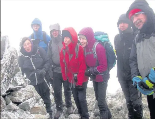  ??  ?? Hinckley Mountainee­ring and Hill Walking Club battled snow and ice to climb a fell in the Lake District.