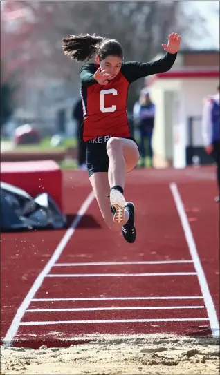  ?? DAVID C. TURBEN — FOR THE NEWS-HERALD ?? Cardinal’s Karalyn Rutkowski won long jump with a 15-1 on March 31 during the Huskies’ dual with Grand Valley, their first meet on their new all-weather track.