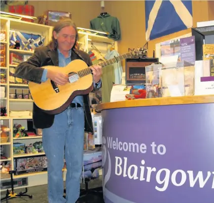  ??  ?? Popular Dougie MacLean once performed Caledonia in Blairgowri­e’s tourist informatio­n centre in the build-up to Perthshire’s Amber Festival