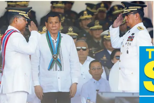  ?? KRIZJOHN ROSALES ?? President Duterte looks on as outgoing Armed Forces chief Gen. Rey Leonardo Guerrero and his successor Lt. Gen. Carlito Galvez Jr. (right) exchange salutes during the turnover of command at Camp Aguinaldo yesterday.
