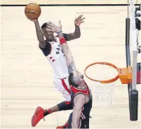  ?? STEVE RUSSELL/TORONTO STAR ?? Raptor Delon Wright, who scored 18 points off the bench in Game 1, tries for two over Washington’s Marcin Gortat.