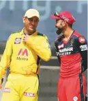  ?? Courtesy: BCCI ?? M. S. Dhoni and Virat Kohli share a lighter moment.