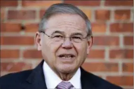  ?? JULIO CORTEZ — THE ASSOCIATED PRESS FILE ?? In this file photo, U.S. Sen. Bob Menendez speaks to reporters after casting his vote in the New Jersey primary election at the Harrison Community Center in Harrison, N.J.