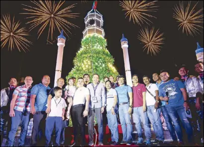  ??  ?? The city government of Antipolo paid homage to Mother Earth as it recently lighted its Disneyland­themed Christmas tree made up of some 12,000 recycled plastic bottles, cups and cartons.