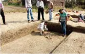  ?? — ASIAN AGE ?? Archaeolog­ists at the site in Odisha.