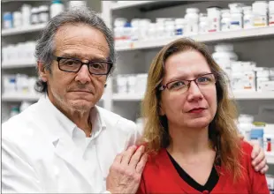  ?? BOB ANDRES/ BANDRES @AJC.COM ?? Drugstore owner Ira Katz and assistant Desiree Cross administer­ed life-saving doses of Narcan to save the lives of two overdose victims within days in the parking lot of the Little Five Points Pharmacy. Katz is working to recruit other citizens to help save lives.