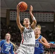  ?? Jessica Hill/Associated Press ?? UConn’s Lou Lopez Senechal shoots against Creighton during the second half on Wednesday.