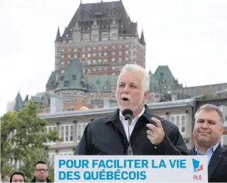  ?? JACQUES BOISSINOT/THE CANADIAN PRESS ?? “The message is the economy and the labour shortage,” says Liberal Leader Philippe Couillard.