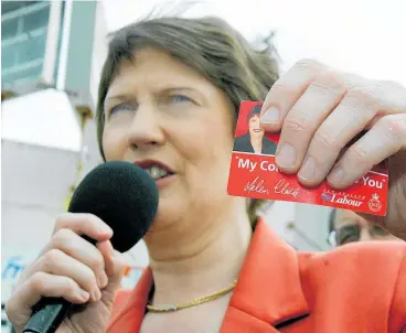  ?? Photo / NZME file ?? Helen Clark with Labour’s 2005 pledge card — paid for with public money that had to be repaid.