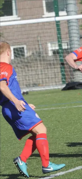  ??  ?? Padraig Browne of Bay clears the ball away for a Boyne Harps’ corner.