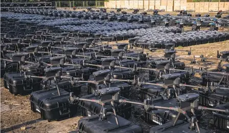  ?? LIBKOS VIA AP ?? The Ukrainian military displays 1,700 drones in Kyiv, Ukraine, before they are sent to the front line to be used against Russian forces Tuesday.