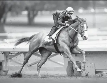  ?? Alex Evers Eclipse Sportswire/Getty Images ?? PREPARING for Saturday’s Santa Anita Derby, Justify and Drayden Van Dyke work out at Arcadia track.