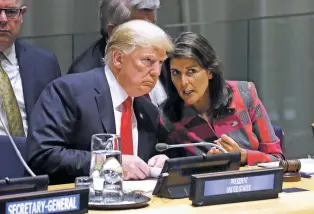  ?? EVAN VUCCI/ASSOCIATED PRESS ?? President Donald Trump talks to Nikki Haley, U.S. ambassador to the United Nations, on Monday at the United Nations General Assembly at U.N. Headquarte­rs.