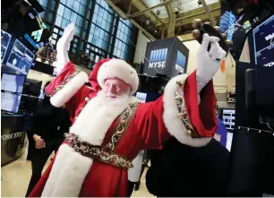  ??  ?? HO-HO-HO! Investors are hoping many factors will bring them cheer towards the end of 2017. —