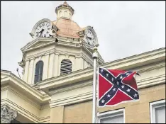  ?? ROSALIND BENTLEY / AJC ?? A dispute in Douglas County occurred days after a mass shooting killed nine people and sparked a national debate over the Confederat­e battle flag.