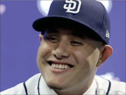  ?? CHARLIE RIEDEL — THE ASSOCIATED PRESS ?? Manny Machado talks to the media during a news conference at San Diego Padres spring training baseball camp in Peoria, Ariz., on Friday.