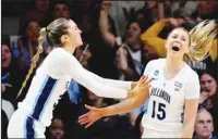  ?? ?? Villanova’s Bella Runyan (left), and Brooke Mullin (15) react during the first half of a second-round college basketball game against Florida Gulf Coast in the NCAA Tournament in Villanova, Pa. (AP)