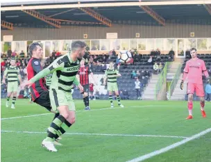  ?? Peter Hilton Photograph­y ?? Action from Macclesfie­ld’s FA Cup first round tie against Forest Green Rovers at the New Lawn Stadium