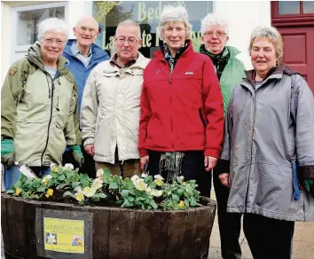  ??  ?? Doing their best Strathaven in Bloom volunteers say they can’t take up the slack created by cutbacks