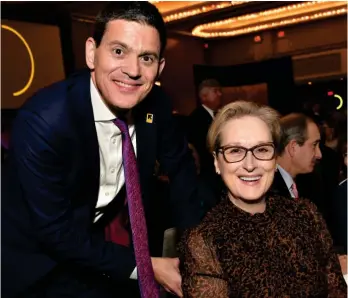  ?? ?? Critic: Ex-Labour minister David Miliband with Meryl Streep in New York in 2017