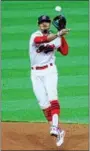  ?? TIM PHILLIS — THE NEWS-HERALD ?? Francisco Lindor makes a throw during Game 1 of the American League Division Series against the Yankees on Oct. 5 at Progressiv­e Field.