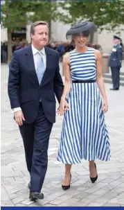  ??  ?? ABOVE: Prime minister David Cameron and his wife, Samantha – who raised eyebrows by wearing a sleeveless top. Not proper decorum for the occasion, it seems.