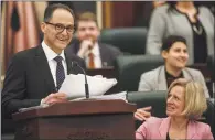  ?? CP PHOTO JASON FRANSON ?? Alberta President of Treasury Board and Minister of Finance Joe Ceci delivers the budget Thursday as Premier Rachel Notley listens.