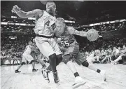  ?? [AP PHOTO] ?? 3 Headed Monsters’ Jason Williams, right, drives against Ghost Ballers’ Ivan Johnson during the first half of a BIG3 League game at the Barclays Center in New York, Sunday.