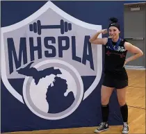  ?? COURTESY PHOTO ?? Lira Bordoley, a senior at Birmingham Seaholm High School, poses after winning the 123-pound state championsh­ip at the Michigan High School Powerlifti­ng Associatio­n state finals at Adrian High School on March 13.