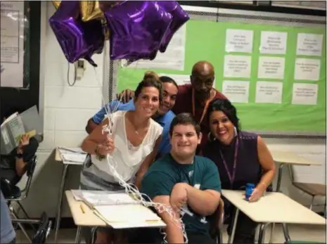  ?? SUBMITTED PICTURE ?? Pictured with John Rybnik, center, are, from left, are Assistant Principal Jill Palladino, school counselor Adam Coleman, personal care assistant Joe Reavis, and Upper Darby High School Principal Kelley Simone.