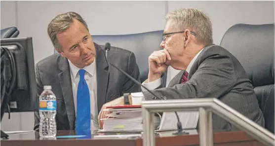  ?? | RICH HEIN/ SUN- TIMES ?? Chicago Public Schools CEO Forrest Claypool, left, and General Counsel Ronald L. Marmer speak at a Chicago Board of Education budget hearing.