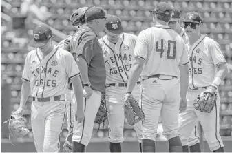  ?? Stephen Spillman ?? Texas A&M starter Kaylor Chafin, left, exits after allowing six runs on five hits and a walk while recording just one out in Sunday’s loss to Indiana in Austin.