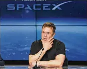  ?? JOHN RAOUX / AP ?? Elon Musk, founder, CEO and lead designer of SpaceX, told reporters that as early as next year he may begin test flights of a rocket for deep space crews.