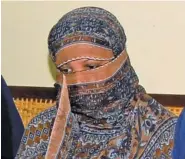  ?? AP FILE PHOTO ?? Aasia Bibi, a Pakistani Christian woman, listens to officials at a prison in Sheikhupur­a near Lahore, Pakistan, in 2010.