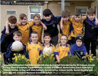  ?? Photo by Michelle Cooper Galvin ?? Some of the Beaufort footballer­s who will play during half time during the All Ireland Joseph Coffey, Fionn O’Sullivan, Fionn Kennedy, Cormac O’Sullivan, Kevin Coffey (back from left) ) Thomas Coffey, Arthur and Jack Gabbett, Éanna Coffey, Callum Smith , Daniel Kissane and John Murphy at Cullina National School Beaufort.