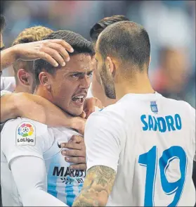  ?? FOTO: EFE ?? Pablo Fornals celebra con Sandro su gol ante el Sevilla, el primero del Málaga