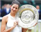  ?? ?? Garbine Muguruza intends to skip the clay and grass seasons to spend time with family.