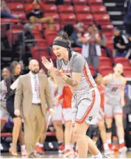  ?? COURTESY OF JUSTIN TAFOYA/NCAA PHOTOS ?? Tesha Buck scored 18 points Monday to help the Lobos beat San Jose State and advance to the quarterfin­als of the MWC Tournament.