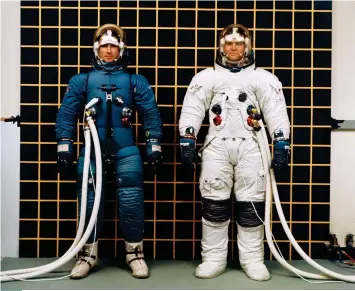  ??  ?? Astronauts James Irwin (left) and John Bull demonstrat­e the Apollo A-6L spacesuit – Bull’s suit incorporat­es the outer white thermal micrometeo­roid protective layer (right), evolving the IVA to an EVA. The 1960 Mercury spacesuit (opposite, left) was a customfitt­ed, modified version of a military jet pressure suit, lined with neoprene-coated nylon and an outer shell of outer aluminised nylon. Even with special sewing it was difficult for a pilot to bend arms or legs. Russia’s Sokol-kv-2 suits (opposite, centre), were developed after three unsuited cosmonauts asphyxiate­d on the 1971 Soyuz 11 mission. The suit is made for Soyuz seats, which prompts users into a foetal position – hence the “cosmonaut stoop” when they’re vertical. It’s analogous to the US “pumpkin suit” (opposite, right), which was developed after the 1986
Columbia shuttle disaster.