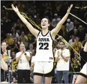  ?? MATTHEW HOLST – GETTY IMAGES ?? Iowa’s Caitlin Clark celebrates during senior day festivitie­s after becoming the NCAA all-time leading scorer Sunday.