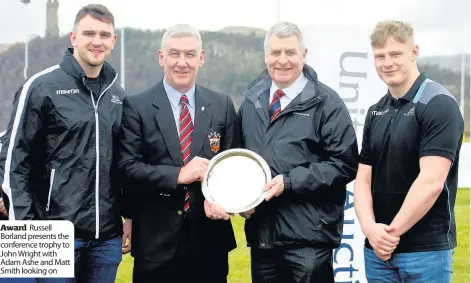  ??  ?? Award Russell Borland presents the conference trophy to John Wright with Adam Ashe and Matt Smith looking on