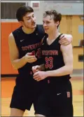  ?? (OWEN MCCUE - MEDIANEWS GROUP ?? Boyertown’s Ryan Schaefer, left, grabs teammate Alex Obarow after Obarow led the Bears to a win over Perkiomen Valley on Tuesday.